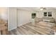 Bright living room with hardwood floors, comfortable seating, and ample natural light at 118 Spicewood Cir, Troutman, NC 28166