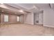 Unfinished basement, featuring neutral walls, carpeting, and windows with blinds at 1365 Winged Foot Dr, Denver, NC 28037