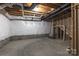 Unfinished basement shows exposed ceiling, pipes, and concrete floors at 1365 Winged Foot Dr, Denver, NC 28037