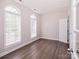Bright room with natural light from windows, hardwood floors and doors with glass panes at 1365 Winged Foot Dr, Denver, NC 28037