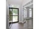 Inviting entryway with hardwood floors, natural light, and an open view of the home's interior at 1365 Winged Foot Dr, Denver, NC 28037