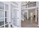 Elegant foyer with hardwood floors, staircase, and an open view of the living spaces at 1365 Winged Foot Dr, Denver, NC 28037