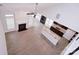 Bright living room boasts fireplace, hardwood floors, and open layout to the kitchen with a large island at 1365 Winged Foot Dr, Denver, NC 28037