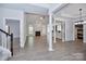 Bright and airy living room featuring hardwood floors, a fireplace, and an open layout at 1365 Winged Foot Dr, Denver, NC 28037