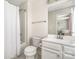 Well-lit bathroom with a shower/tub combo and white fixtures at 1636 Tundra Ln, Denver, NC 28037
