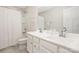 Bathroom with double sink vanity, shower and tub combination, and ample lighting at 1636 Tundra Ln, Denver, NC 28037