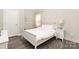 Cozy bedroom with natural light, hardwood floors, and neutral decor at 1636 Tundra Ln, Denver, NC 28037