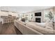 Open concept living space seamlessly connects the kitchen, dining area, and living room, enhancing modern living at 1636 Tundra Ln, Denver, NC 28037