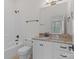 Well-lit bathroom featuring tub/shower, granite vanity with double sinks, neutral color palette, and modern fixtures at 1655 Buckland Ct, Fort Mill, SC 29707