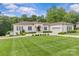 Stately home featuring manicured landscaping, lush lawn, and elegant architectural details, offering exceptional curb appeal at 1655 Buckland Ct, Indian Land, SC 29707
