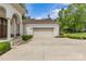 Exterior view of the attached garage with a spacious driveway at 1655 Buckland Ct, Indian Land, SC 29707