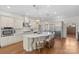 Gourmet kitchen featuring a center island, stainless appliances, and custom cabinets providing ample storage at 1655 Buckland Ct, Indian Land, SC 29707