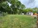 Large backyard with plenty of grass and privacy at 1703 Lowder St, Albemarle, NC 28001