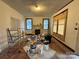 Spacious living room with hardwood floors and fireplace awaiting finishing touches at 1703 Lowder St, Albemarle, NC 28001