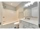 This bathroom features a shower-tub combo, a vanity with sink and a square mirror at 173 Greenridge Rd, Lake Wylie, SC 29710