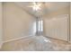Bright bedroom with carpeted floors, double door closet, and ample space, ready for relaxation and rest at 173 Greenridge Rd, Lake Wylie, SC 29710