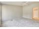 Spacious bedroom with a ceiling fan and neutral carpet, awaiting personal touches for comfort at 173 Greenridge Rd, Lake Wylie, SC 29710
