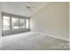 Bright bedroom featuring large windows and neutral tones, creating a serene and inviting space at 173 Greenridge Rd, Lake Wylie, SC 29710