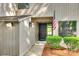 Inviting front entrance with a black door, American flag, and well-maintained landscaping at 173 Greenridge Rd, Lake Wylie, SC 29710