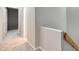 Upstairs hallway with neutral walls and carpet at 173 Greenridge Rd, Lake Wylie, SC 29710