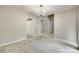 Open living room with neutral paint and carpet leading to the stairway at 173 Greenridge Rd, Lake Wylie, SC 29710