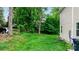 The home has a sprawling backyard shaded by mature trees, creating a peaceful retreat at 1735 15Th Street Ne Pl, Hickory, NC 28601