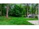 The home has a sprawling backyard shaded by mature trees, creating a peaceful retreat at 1735 15Th Street Ne Pl, Hickory, NC 28601