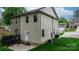 This home features a charming backyard with mature trees and a partially fenced yard at 1735 15Th Street Ne Pl, Hickory, NC 28601