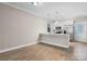 Dining room with stainless steel appliances, hardwood floors, and a bar at 1735 15Th Street Ne Pl, Hickory, NC 28601