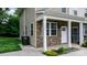 Close up view of a stone accent two-story home with the street number, 1735, displayed at 1735 15Th Street Ne Pl, Hickory, NC 28601