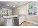 Kitchen featuring granite countertops, stainless steel appliances, and a window at 1735 15Th Street Ne Pl, Hickory, NC 28601