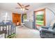 Bright Bedroom featuring playful decor, a comfortable chair and a cozy crib at 174 Wintergreen Cir, Statesville, NC 28677