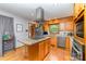 A kitchen featuring stainless steel appliances, granite countertops and a center island with cooktop at 174 Wintergreen Cir, Statesville, NC 28677