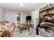 Comfortable living room with large window, plush sofa and built in shelves at 174 Wintergreen Cir, Statesville, NC 28677