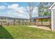The backyard with a wooden privacy fence and covered patio area provide a private outdoor space at 1832 Montclair Ave, Gastonia, NC 28054