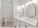 Bathroom featuring double sinks, modern vanities, and sleek finishes at 1832 Montclair Ave, Gastonia, NC 28054