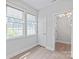 Bright bedroom with two windows and modern flooring at 1832 Montclair Ave, Gastonia, NC 28054