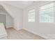 Bright bedroom with natural light, hardwood floors, and ample space at 1832 Montclair Ave, Gastonia, NC 28054