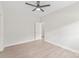 Bright bedroom with ceiling fan and light-colored laminate flooring at 1832 Montclair Ave, Gastonia, NC 28054