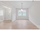 Open dining area features updated lighting at 1832 Montclair Ave, Gastonia, NC 28054