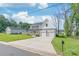 Beautiful home featuring a long driveway, two-car garage, and a well-maintained front lawn at 1832 Montclair Ave, Gastonia, NC 28054