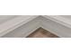 A close-up of the hardwood floors with white trim at 1832 Montclair Ave, Gastonia, NC 28054