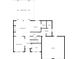 Detailed floor plan of the first floor, highlighting the layout of the living room, kitchen, and garage at 1832 Montclair Ave, Gastonia, NC 28054