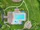 Aerial view of a community pool and recreation area surrounded by green space at 2218 Legacy Oak Dr, Waxhaw, NC 28173