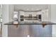 Stylish kitchen with granite countertops, stainless steel appliances, and white cabinetry offers ample space for cooking at 2218 Legacy Oak Dr, Waxhaw, NC 28173