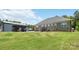 Lush backyard with swimming pool and an outdoor dining area for entertaining and relaxation at 2489 Highway 161 S Hwy, York, SC 29745