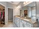 Main bathroom featuring a double vanity, granite countertops, and a walk-in closet at 2489 Highway 161 S Hwy, York, SC 29745