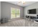Carpeted bedroom with ample natural light from a window and neutral paint at 2489 Highway 161 S Hwy, York, SC 29745