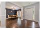 Bright dining room with hardwood floors and a rustic wooden dining table at 2489 Highway 161 S Hwy, York, SC 29745