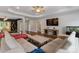 Spacious living room featuring hardwood floors, ceiling fan, tv, and neutral sectional sofa at 2489 Highway 161 S Hwy, York, SC 29745